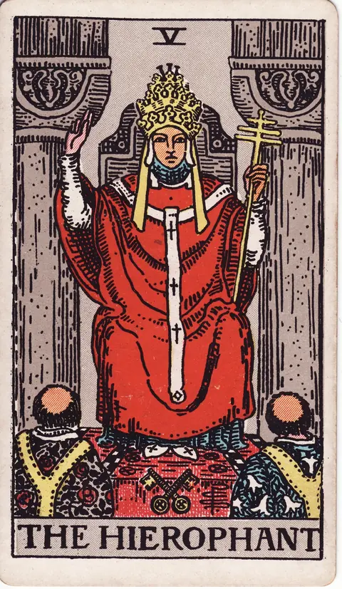 The Hierophant blessing two kneeling students, with crossed keys at his feet